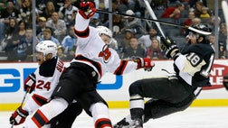  Sidney Crosby and Chris Kunitz each had a goal and two assists, and the Pittsburgh Penguins picked up their first home victory of the season by beating the New Jersey Devils - Sunday.